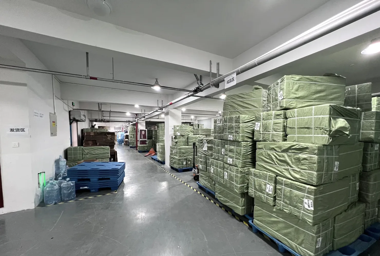 Shipping area with pallets of packed orders ready for worldwide dispatch