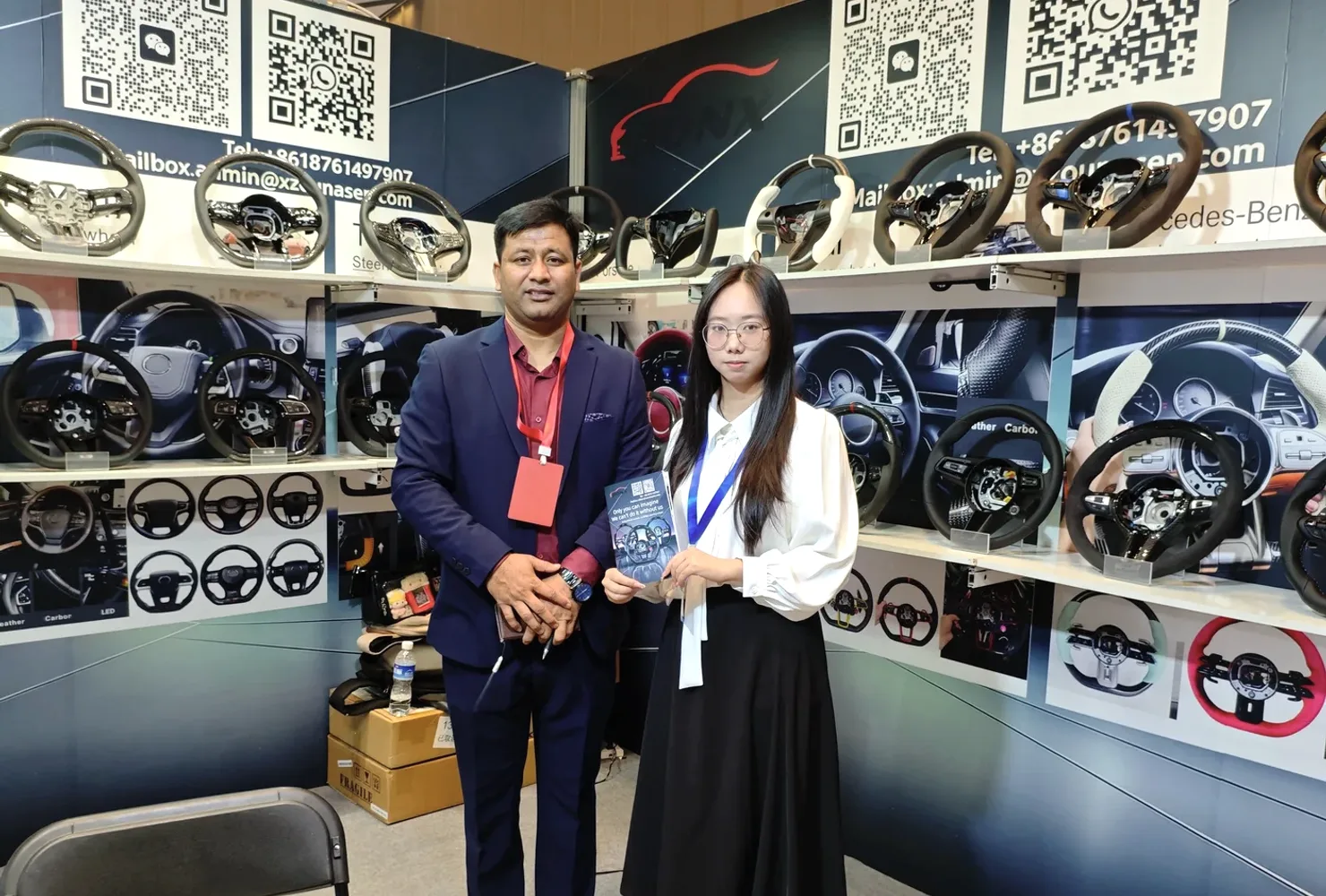 AKIUMI steering wheel display at a trade show booth